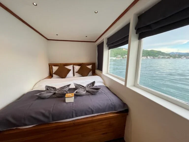 Cozy interior cabin on the Lanakila phinisi boat. — Lanakila