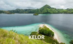 Aerial view of Kelor Island showcasing turquoise waters and green hills, part of the Komodo National Park sailing trip.
